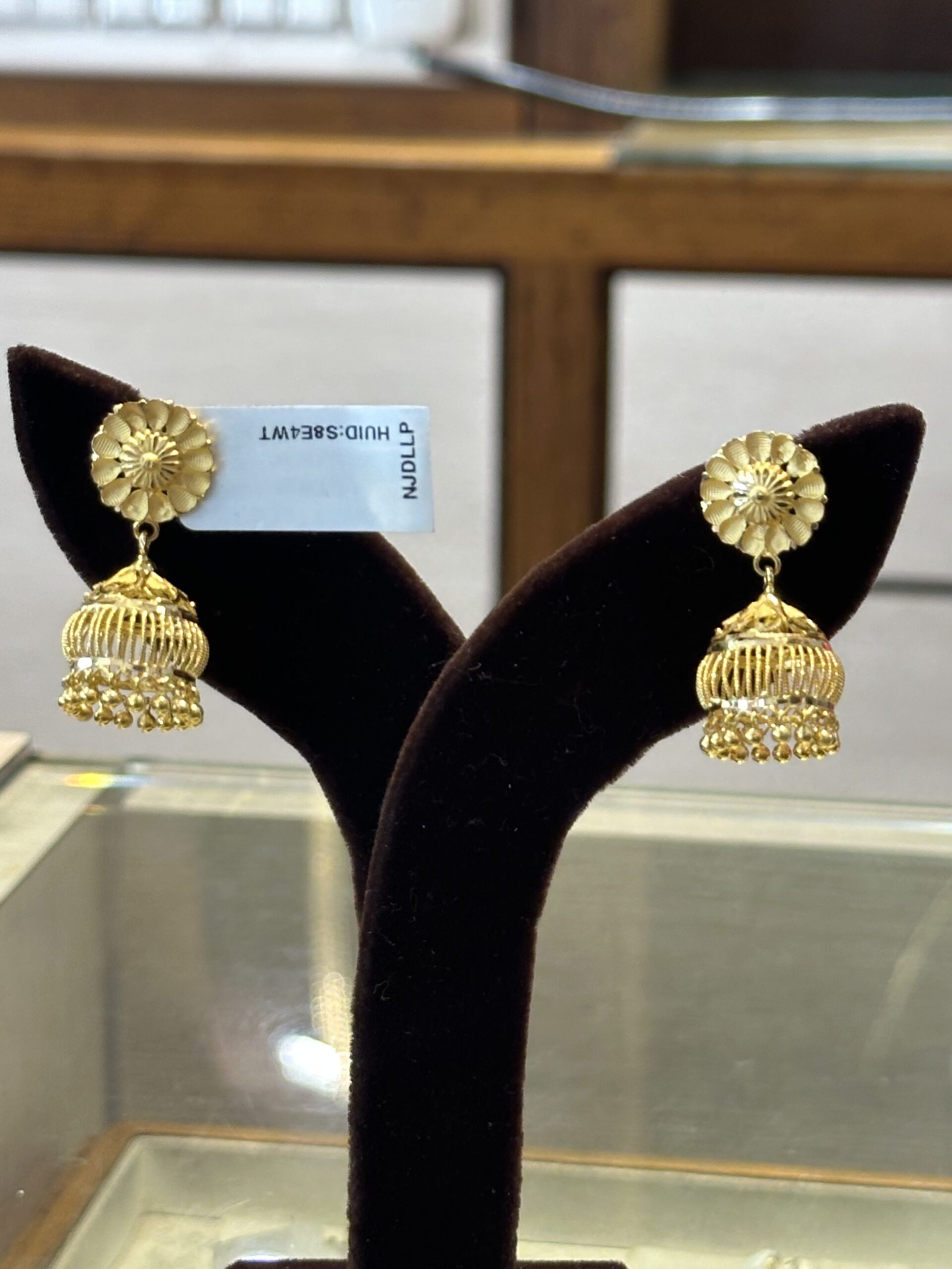 Gold Jhumka Earrings